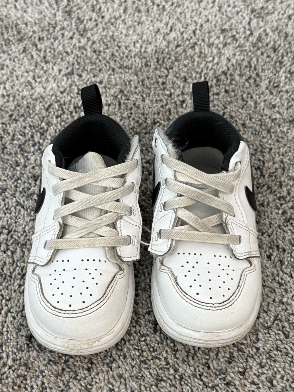 Kids White Nike Sneakers with Black Accent